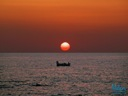 Pollonia Milos - Boat against Sunset